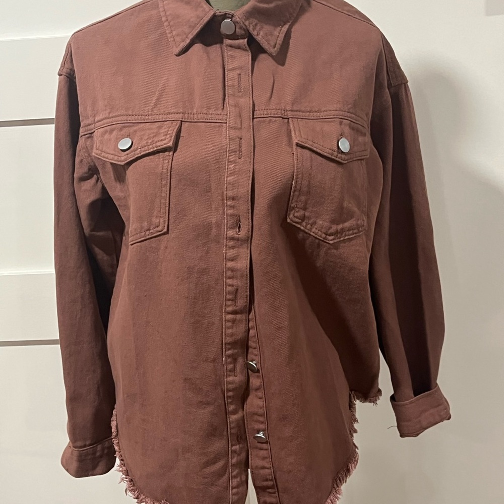 Brown Button-Up Shirt Jacket . Brown denim with fringe shirt tail hem